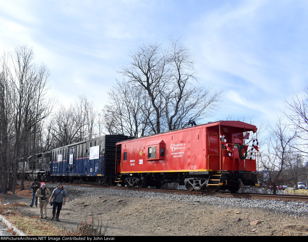 The Dover & Rockaway River RR TFT train heads away from the Route 46 Xing in Kenvil